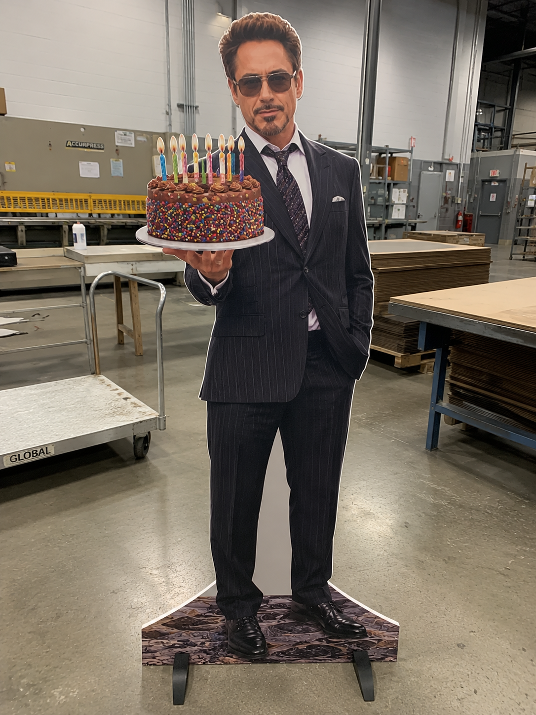 A suited character standee made for a surprise birthday setup.